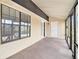 Enclosed patio with neutral carpet and white walls, perfect for relaxing or entertaining at 5509 Park S Pl, Atlanta, GA 30349