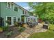 Backyard patio with comfortable outdoor seating area at 1206 Red Fox Cir, Woodstock, GA 30188