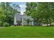 Charming home with well-manicured lawn and mature trees at 1206 Red Fox Cir, Woodstock, GA 30188