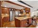 Spacious kitchen features a large island with granite countertops and stainless steel appliances at 1206 Red Fox Cir, Woodstock, GA 30188