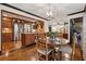 Open-concept kitchen with stainless steel appliances and hardwood cabinets at 1206 Red Fox Cir, Woodstock, GA 30188