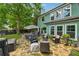Outdoor patio area featuring a stone surface and comfortable seating at 1206 Red Fox Cir, Woodstock, GA 30188