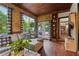 Cozy sunroom with wood ceiling and walls, plus a large window and sliding glass door at 1206 Red Fox Cir, Woodstock, GA 30188
