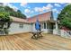 Wide view of the porch with an umbrella, looking towards the home at 1365 Lower Creighton Rd, Cumming, GA 30028