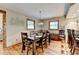 Dining room features hardwood floors and adjacent serving area at 1365 Lower Creighton Rd, Cumming, GA 30028