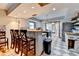 Open kitchen with butcher block countertops, stainless steel appliances, and large kitchen island with barstool seating at 1365 Lower Creighton Rd, Cumming, GA 30028