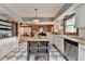 Open kitchen layout with an island, stainless steel appliances, and wood countertops at 1365 Lower Creighton Rd, Cumming, GA 30028