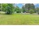 This large lot features grassy pastures and is fully fenced at 1365 Lower Creighton Rd, Cumming, GA 30028