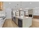 Well-equipped kitchen featuring a large island with stainless steel appliances at 157 Shadburn Ferry Rd, Buford, GA 30518