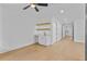 Open concept living room featuring a wet bar, hardwood floors, and recessed lighting at 157 Shadburn Ferry Rd, Buford, GA 30518