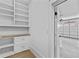 Bright mudroom features custom built-ins, drawers, and a view of the garage space at 157 Shadburn Ferry Rd, Buford, GA 30518