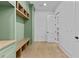 Bright and airy mudroom with built-in storage and seating at 157 Shadburn Ferry Rd, Buford, GA 30518