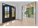 Stylish office featuring hardwood floors, built-in shelving, and abundant natural light at 157 Shadburn Ferry Rd, Buford, GA 30518