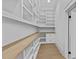 Walk-in pantry offers ample shelving and storage space at 157 Shadburn Ferry Rd, Buford, GA 30518