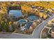 Lovely aerial view of community amenities including tennis courts, pool, playground and lake at 3224 Wolf Club Sw Ln, Atlanta, GA 30349