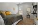 Cozy bedroom featuring plush carpet, natural light, and a calm aesthetic at 3224 Wolf Club Sw Ln, Atlanta, GA 30349