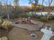 Community playground offering a fun and safe play area for children with slides, climbing structures, and a nearby lake at 3224 Wolf Club Sw Ln, Atlanta, GA 30349