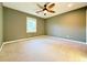 Bright and airy bedroom with a ceiling fan, offering a comfortable living space at 8710 Mount Rushmore Dr, Johns Creek, GA 30022