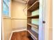 Walk-in closet with custom shelving at 8710 Mount Rushmore Dr, Johns Creek, GA 30022