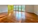Spacious dining room with hardwood floors and an abundance of natural light at 8710 Mount Rushmore Dr, Johns Creek, GA 30022