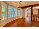 Dining room with large windows and hardwood floors at 8710 Mount Rushmore Dr, Johns Creek, GA 30022
