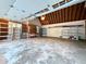 Large garage space with shelving, workbench and lots of storage at 8710 Mount Rushmore Dr, Johns Creek, GA 30022