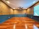 Large bonus room with hardwood floors and neutral walls at 8710 Mount Rushmore Dr, Johns Creek, GA 30022