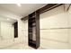 Spacious walk-in closet with custom shelving and ample storage space, perfect for organization at 8710 Mount Rushmore Dr, Johns Creek, GA 30022