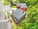 Aerial view of the home highlighting its backyard, deck, and location relative to nearby cul-de-sac and greenery at 931 Hidden Falls Se Ln, Smyrna, GA 30082