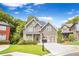 Charming two-story craftsman home with stone accents, a well-kept lawn, and an inviting front porch at 931 Hidden Falls Se Ln, Smyrna, GA 30082