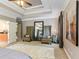Spacious main bedroom with sitting area and elegant appointments at 931 Hidden Falls Se Ln, Smyrna, GA 30082