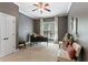 Home office with natural light, desk, and comfortable seating at 931 Hidden Falls Se Ln, Smyrna, GA 30082