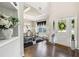 Elegant foyer with hardwood floors, high ceilings, open dining area, and ample natural light at 3126 Cove View Ct, Dacula, GA 30019