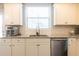 Bright eat-in kitchen featuring stainless steel appliances, granite countertops, and white cabinetry at 3126 Cove View Ct, Dacula, GA 30019