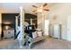 This is a bedroom with a four-poster bed, ceiling fan, carpet, and dresser at 3126 Cove View Ct, Dacula, GA 30019