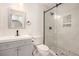 Bathroom with glass-enclosed shower and vanity at 300 Windsor Chase Trl, Johns Creek, GA 30097
