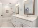 Bathroom with double vanity, and a tub shower combo at 300 Windsor Chase Trl, Johns Creek, GA 30097