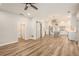 Open floor plan with a view of the kitchen featuring stainless appliances and center island at 300 Windsor Chase Trl, Johns Creek, GA 30097