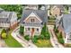 Charming two-story home with inviting front porch, manicured landscaping, and brick-accented driveway at 1122 Parkview Pl, Smyrna, GA 30080