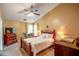 Bedroom features plush carpet, natural light and a ceiling fan at 1055 Kibbe Cir, Lawrenceville, GA 30044