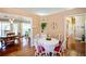 Bright eat-in kitchen with natural light, a breakfast table and connections to other rooms at 1055 Kibbe Cir, Lawrenceville, GA 30044