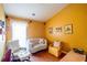 Bright living room with natural light, hardwood floors, and seating area at 1055 Kibbe Cir, Lawrenceville, GA 30044