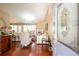 Inviting living room featuring hardwood floors, fireplace, vaulted ceilings, and lots of natural light at 1055 Kibbe Cir, Lawrenceville, GA 30044