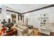 Bright living room with built-in shelves, decorative accents and comfortable seating at 1717 N Decatur Ne Rd # 117, Atlanta, GA 30307