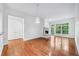 Bright living room with hardwood floors, a fireplace, and large windows that offer lots of natural light at 1717 N Decatur Ne Rd # 117, Atlanta, GA 30307