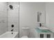 Bathroom showcasing tiled shower and vessel sink at 3634 Oakleaf Pass, Fairburn, GA 30213