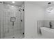 Bathroom boasting a glass enclosed shower and a modern soaking tub at 3634 Oakleaf Pass, Fairburn, GA 30213