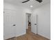 This bedroom features a closet and door to another room at 3634 Oakleaf Pass, Fairburn, GA 30213