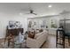 Bright and inviting living room featuring hardwood floors and an open layout for seamless entertaining at 3634 Oakleaf Pass, Fairburn, GA 30213