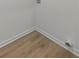 Corner showcases the wood flooring and trim at 3634 Oakleaf Pass, Fairburn, GA 30213